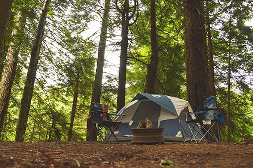 tent in the woods at portage trails